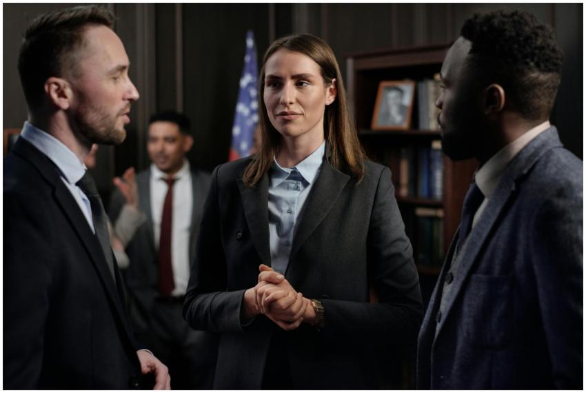 A diverse group of professionals in formal attire