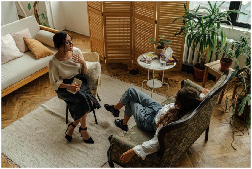 Two women engaged in a psychotherapy session in a