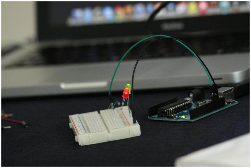Close-up of an Arduino setup on a breadboard with