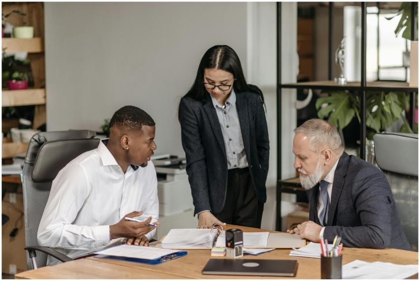 Diverse team engaged in a productive office meetin