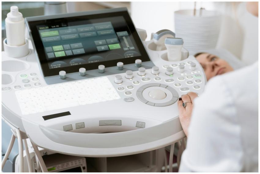 Close-up of a professional conducting an ultrasoun