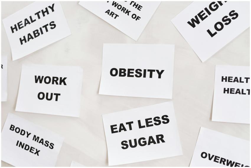 Conceptual image featuring motivational cards on h