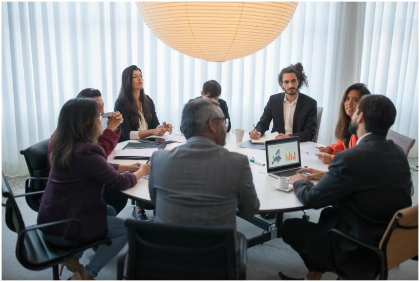 A diverse group of professionals discussing busine