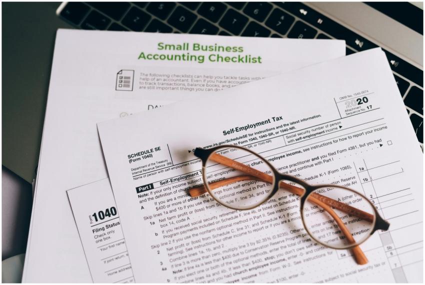 Close-up of tax forms and a small business account