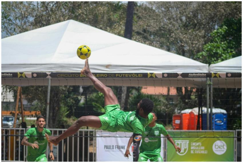 Athletes showcasing futevôlei skills at a sunny to