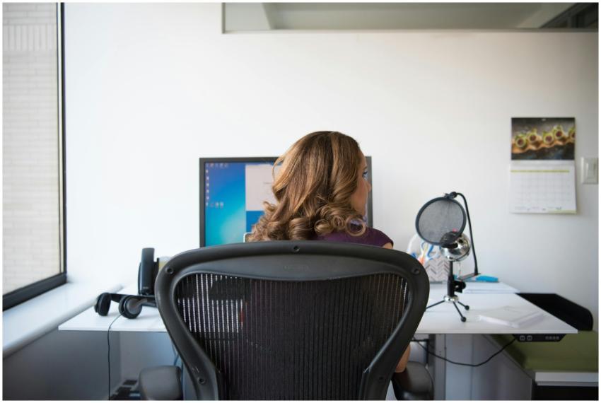 Adult woman working in a contemporary office setti