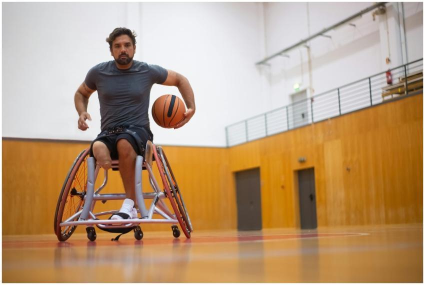 A male wheelchair basketball player practicing ind