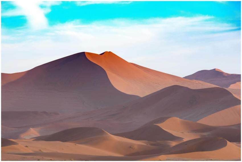 Capture the serene beauty of Namibian sand dunes u