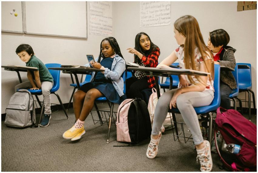 Group of diverse students interacting in a classro