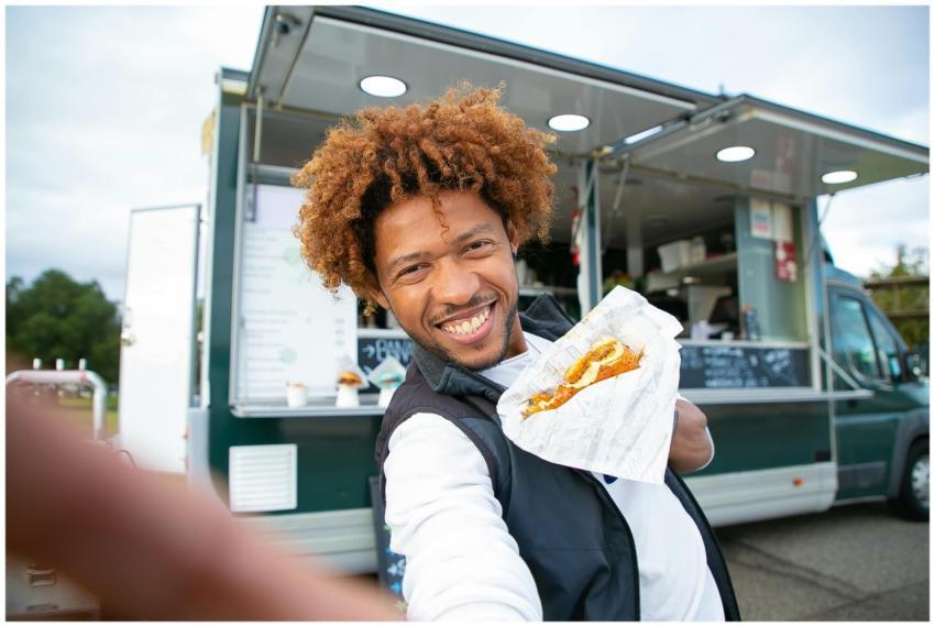 Cheerful African American man with curly hair in c