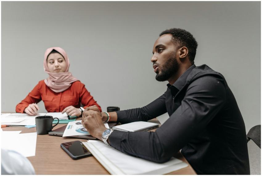 Business meeting with diverse team members discuss
