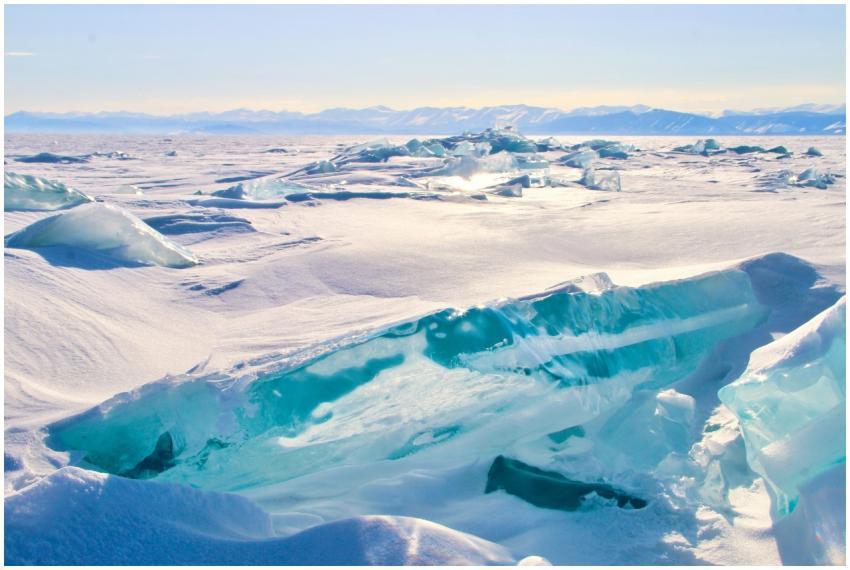 Panoramic view of translucent ice formations in a