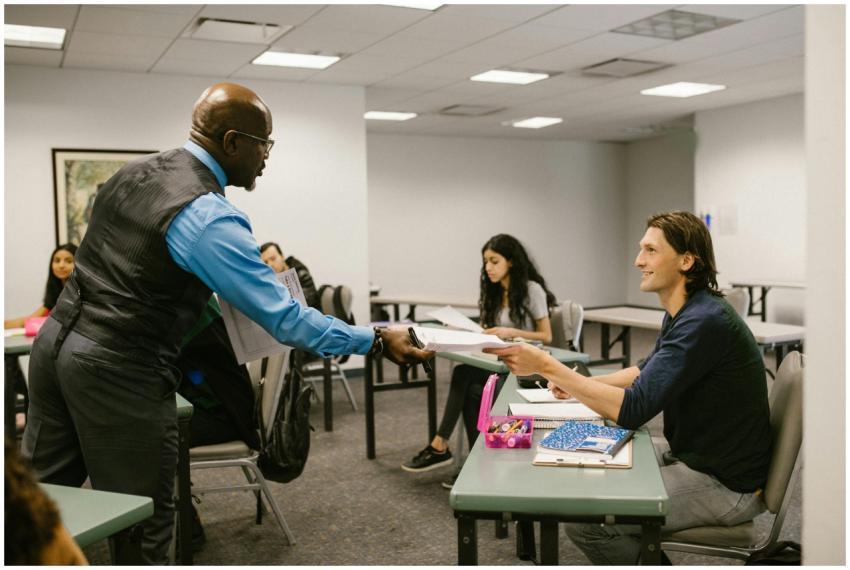 A teacher engaging with students in a university c