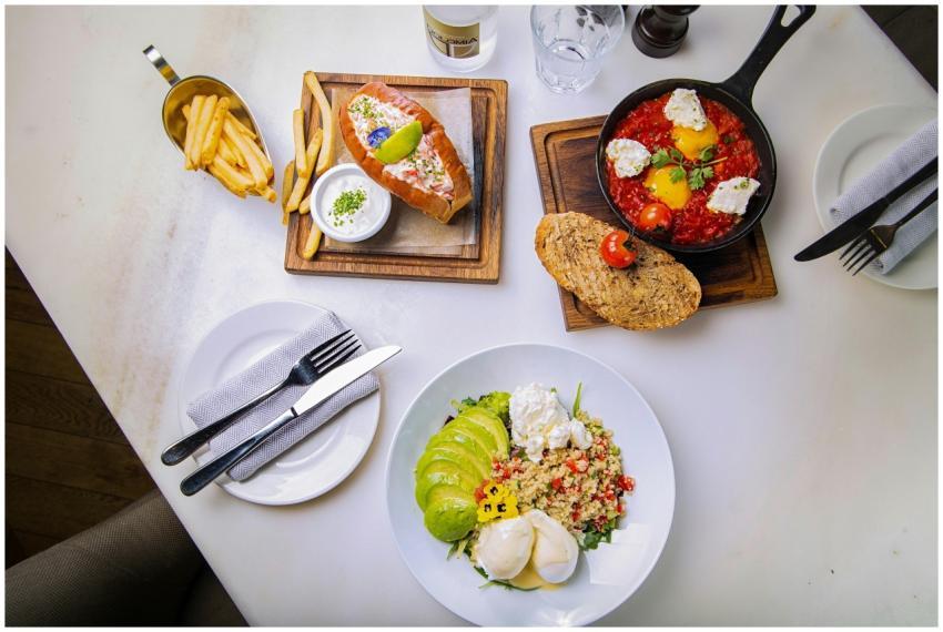 Delicious brunch selection with avocado salad, sha