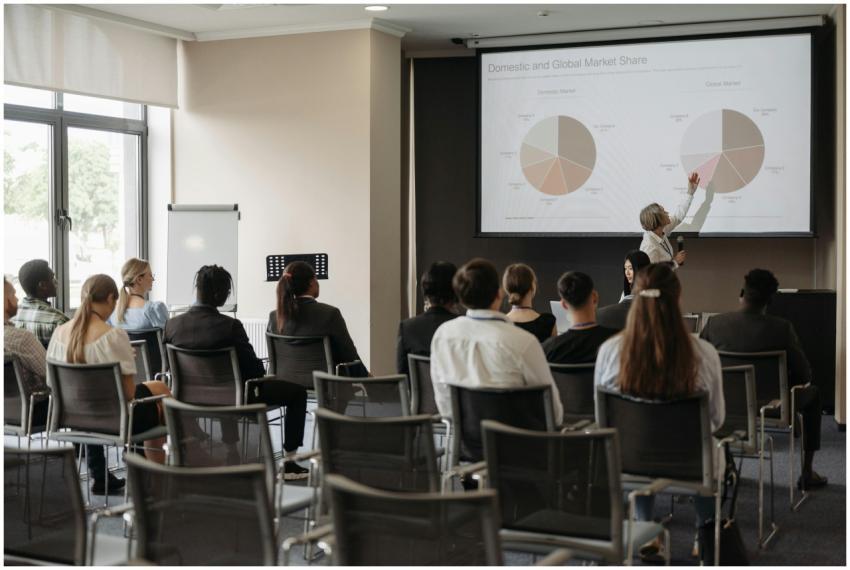 Business professionals attending a seminar with a