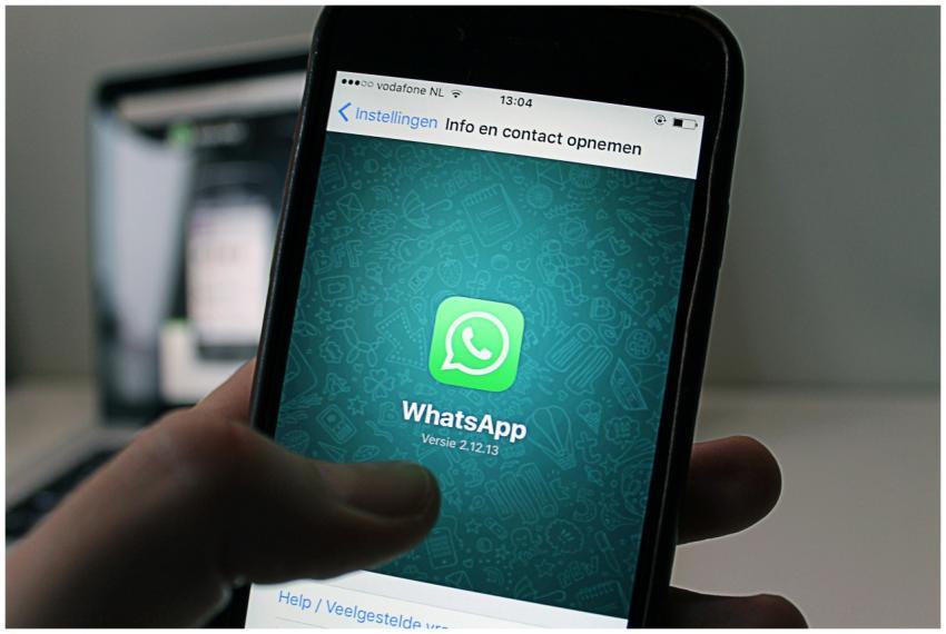 A smartphone displaying the WhatsApp application s