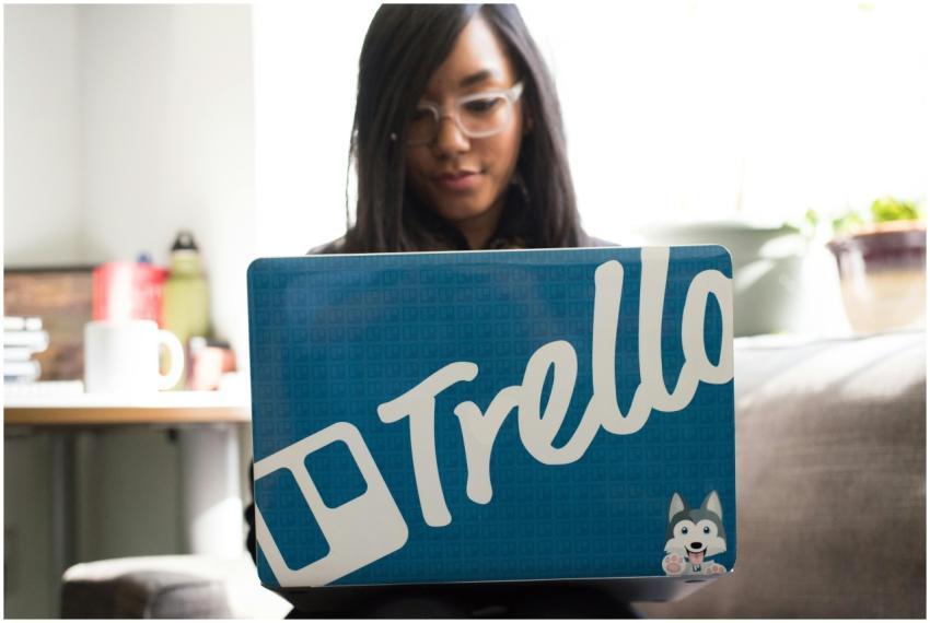 Focused woman engaged in remote work using a Trell