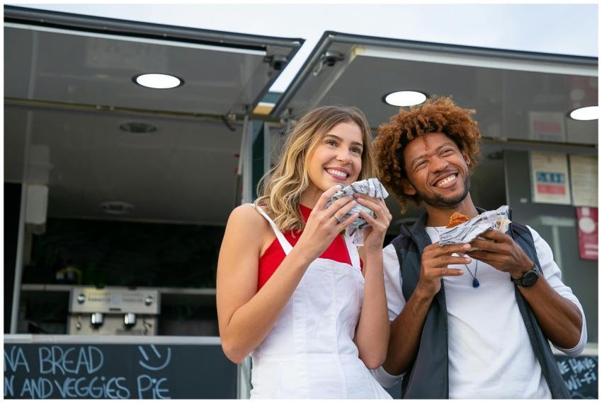 Delighted young multiracial friends wearing casual