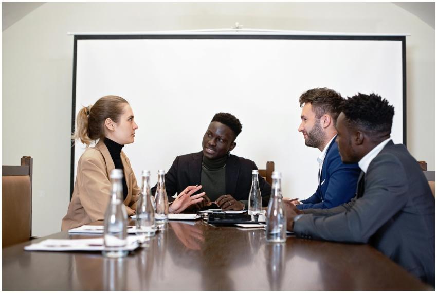 A diverse group of professionals engaged in a busi