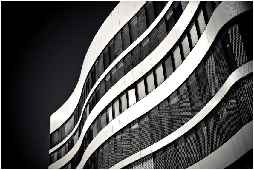 Black and white photo of a modern high-rise with e