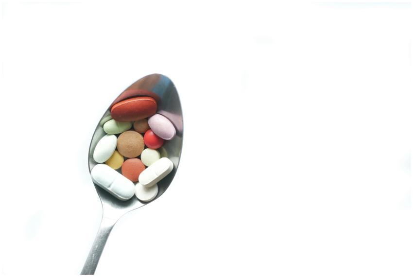 A variety of colorful pills and tablets resting on