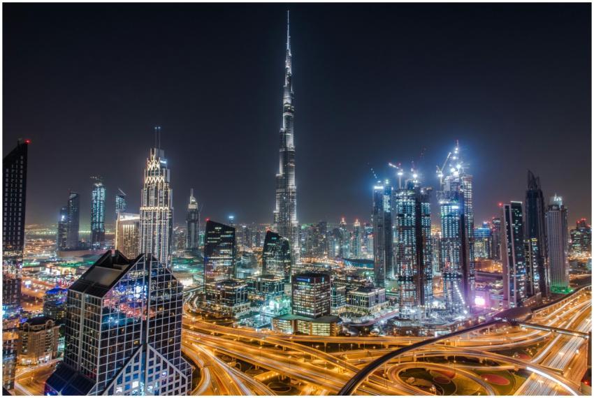 A stunning view of Dubai's illuminated skyline fea