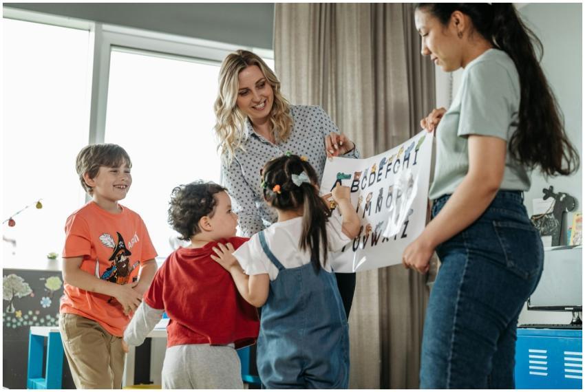 Preschool children and teachers enjoying an intera