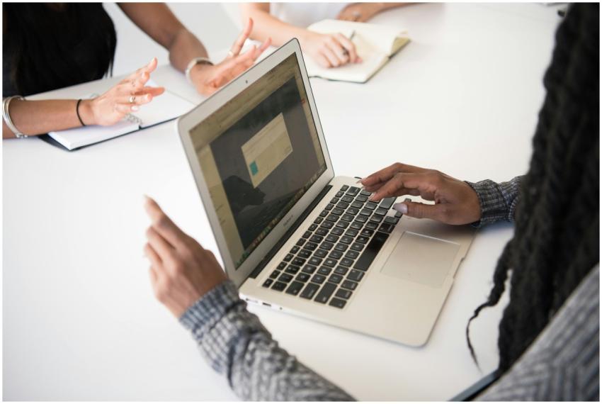 Women collaborating in a modern office workspace u