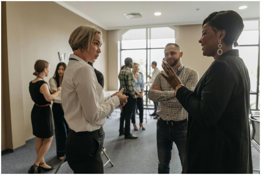 Professionals networking at a corporate event indo