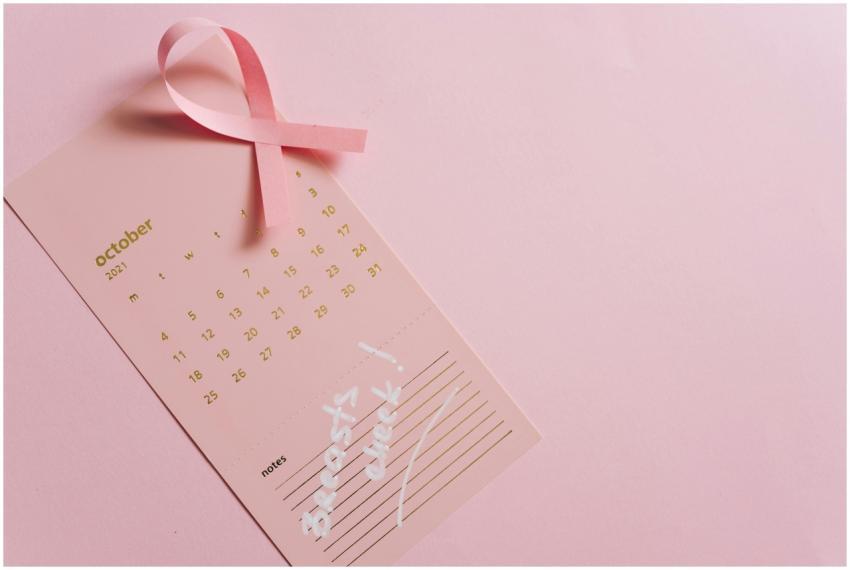 Pink October calendar with ribbon symbolizing brea