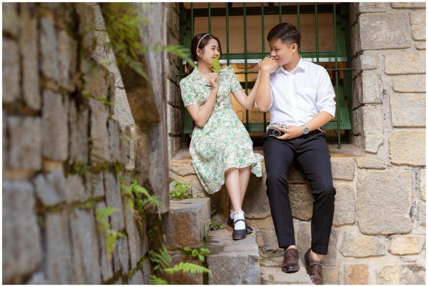 Romantic Couple Sitting Stone