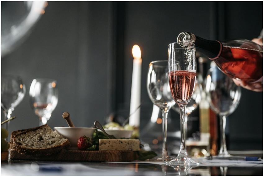 Elegant dinner setting with champagne, candlelight