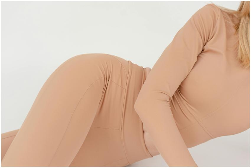 Crop unrecognizable female athlete with blond hair