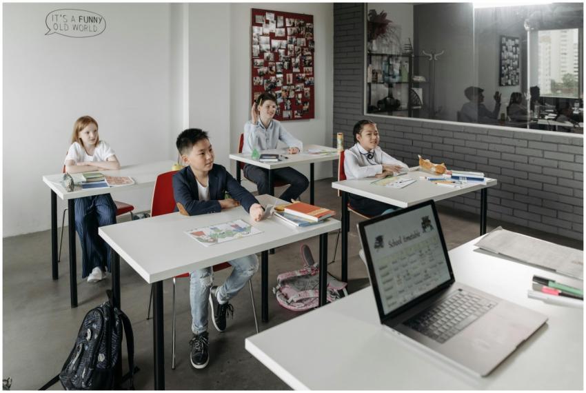 Students attentively listening in a modern, divers