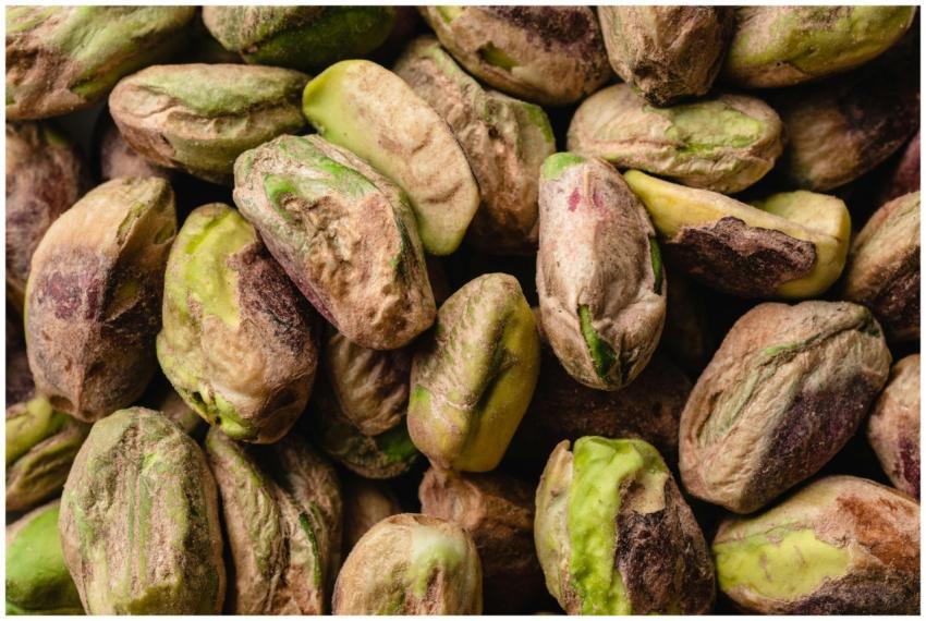 Macro shot of unshelled pistachios showcasing natu