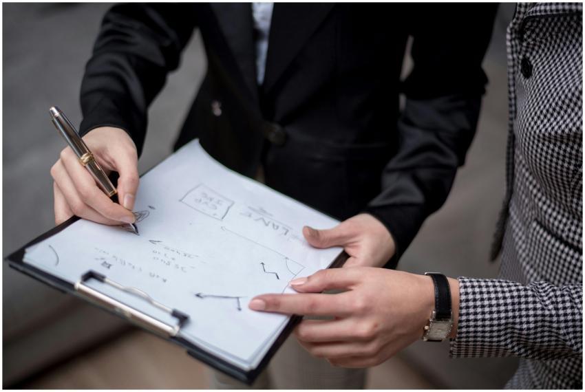 Close-up of professionals collaborating, taking no