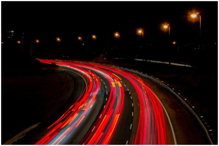A captivating long exposure of a highway at night,