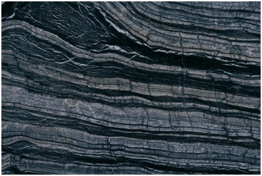 Detailed texture of layered stone, showcasing natu