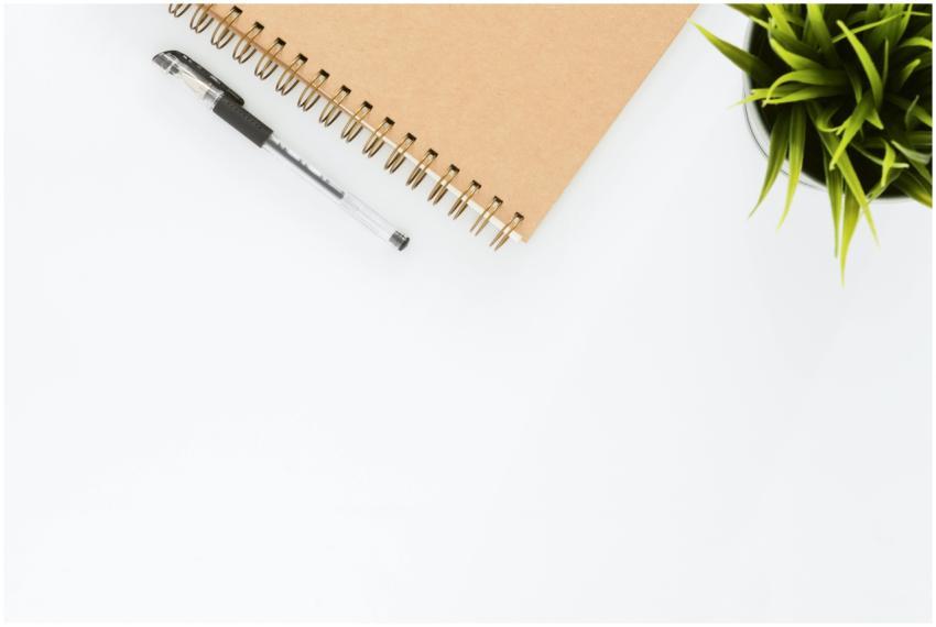 Minimalist stationery setup with a spiral notebook