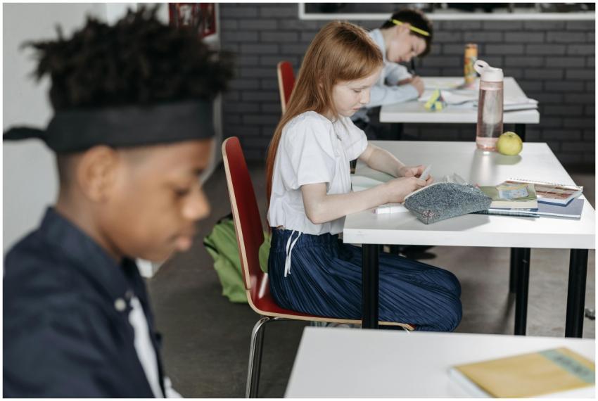 Diverse classroom scene with attentive children wo