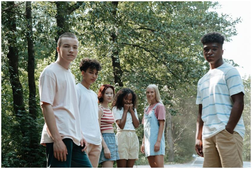 A diverse group of teenagers enjoying a summer day