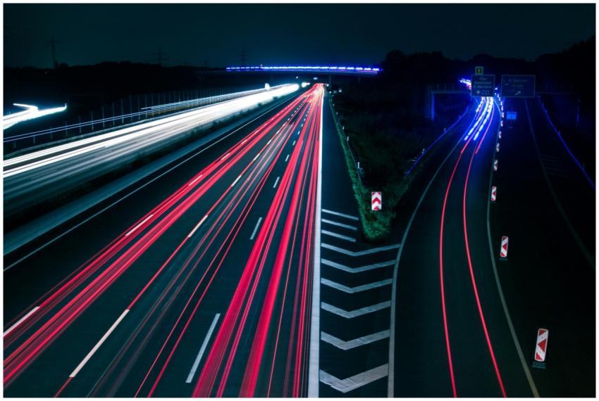 Long exposure photo of highway light trails creati