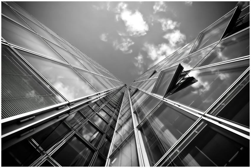 Dramatic low-angle view of a modern skyscraper ref