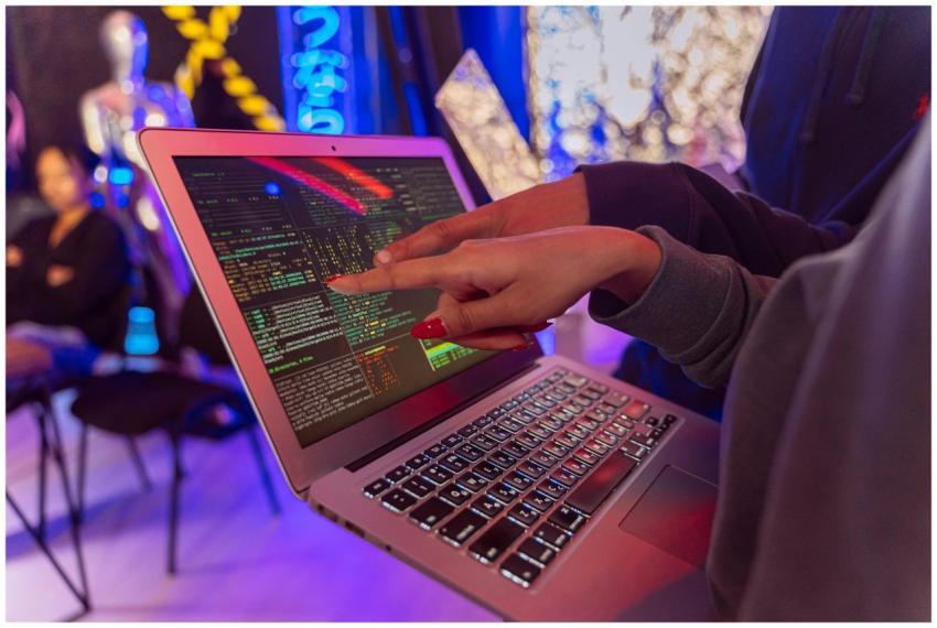 A vibrant scene with hands pointing at a computer