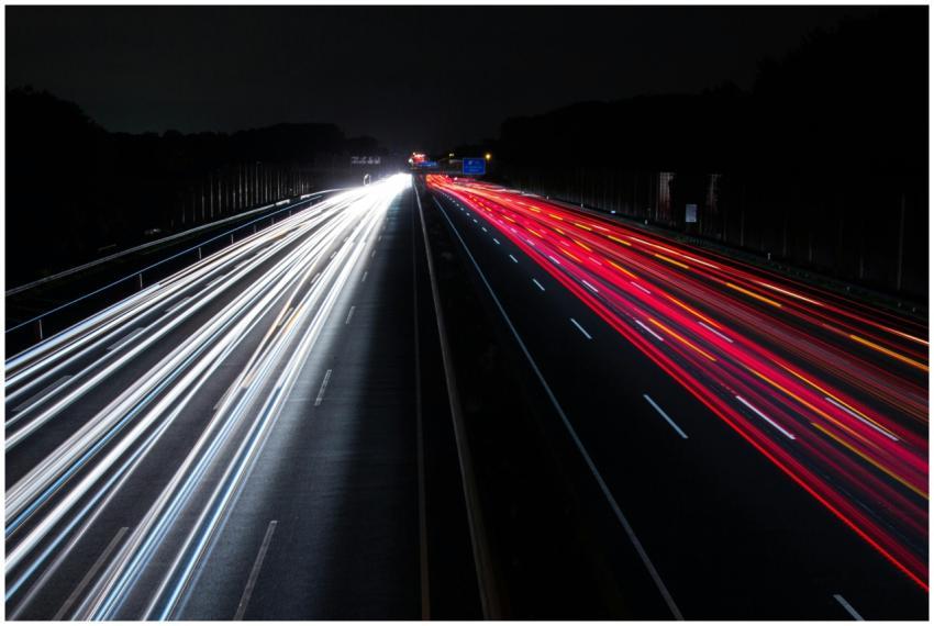 Long exposure of colorful light trails on a highwa