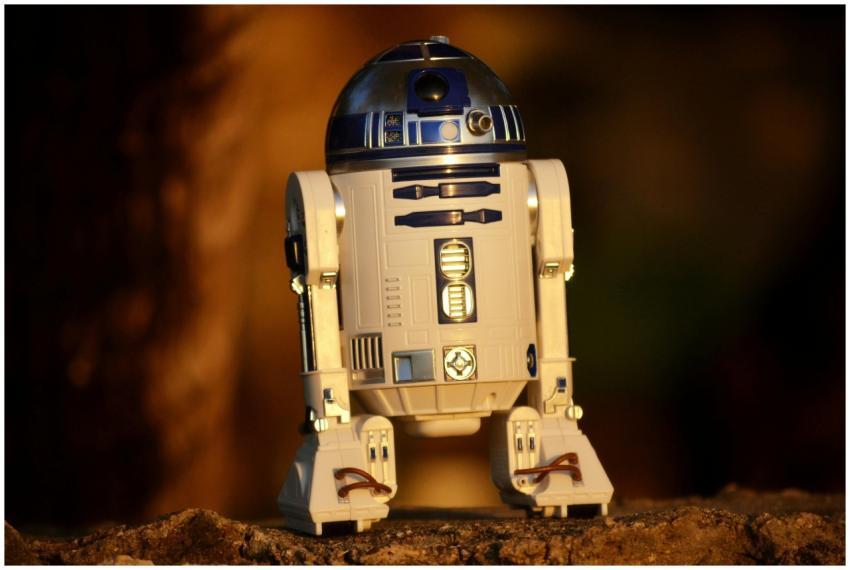 Close-up of a futuristic robot toy outdoors, showc