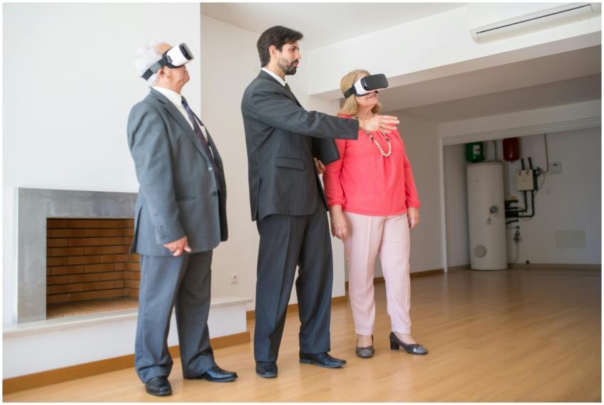 Three adults using virtual reality headsets for a