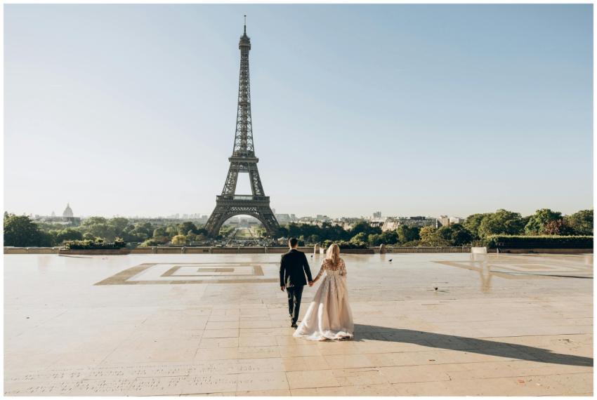 A bride and groom sharing a romantic moment in fro