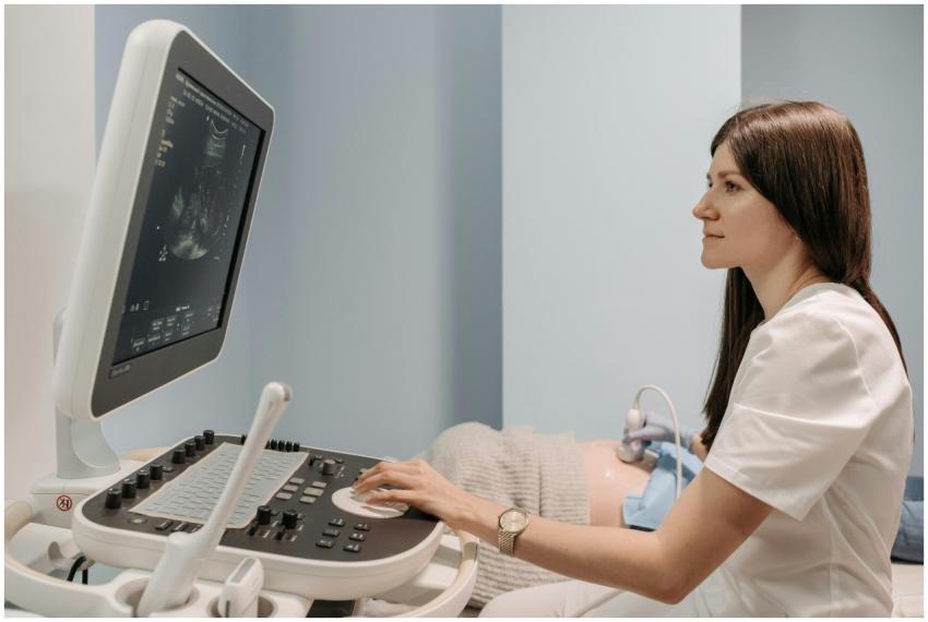 A female doctor conducting an ultrasound examinati