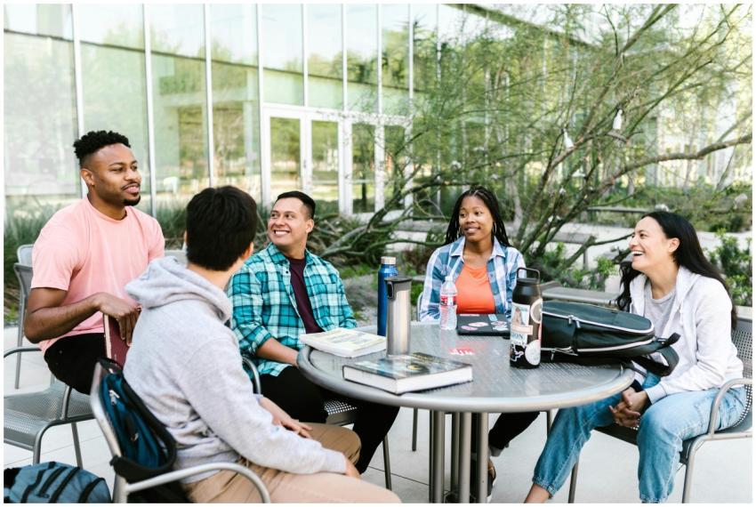 University students studying together outside at a